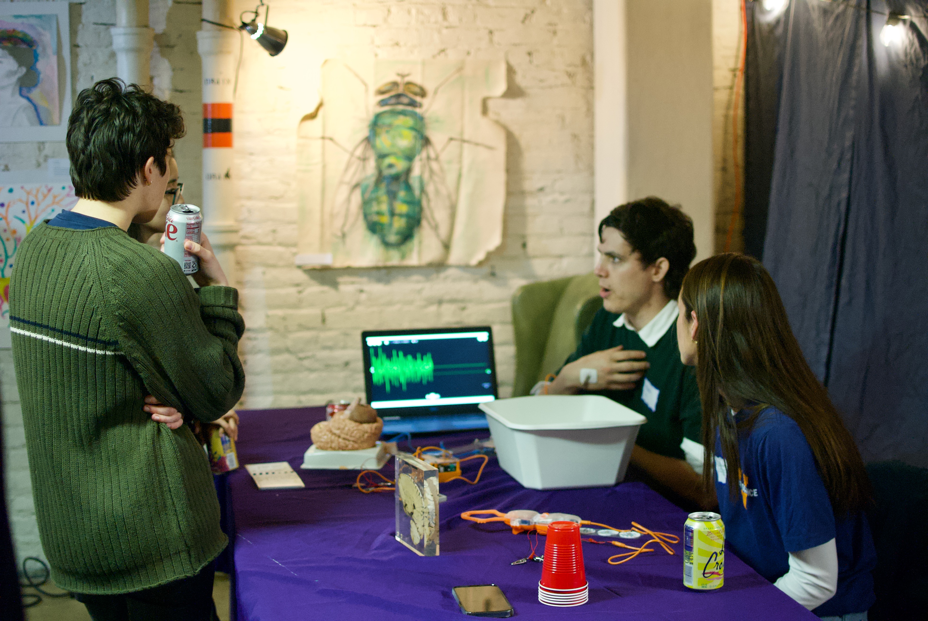 Volunteers from Brain Awareness Outreach present a neuroscience demo.